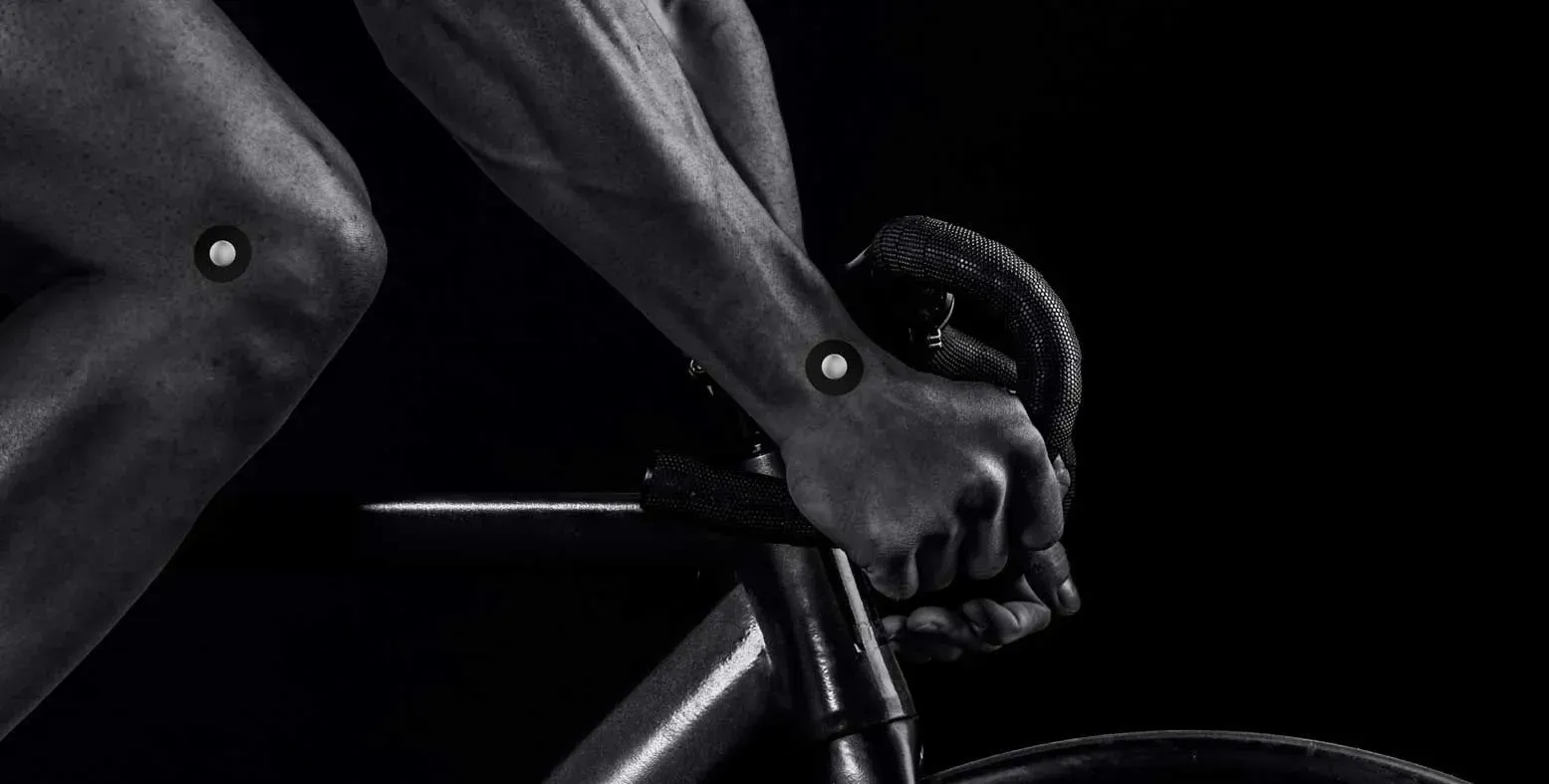 Close-up of cyclist with tracking markers on their hands.